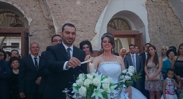Ο γάμος ενός ζευγαριού στα ερείπια της ορθόδοξης εκκλησίας του Αγίου Γεωργίου στη Συρία. - Εικόνα 3